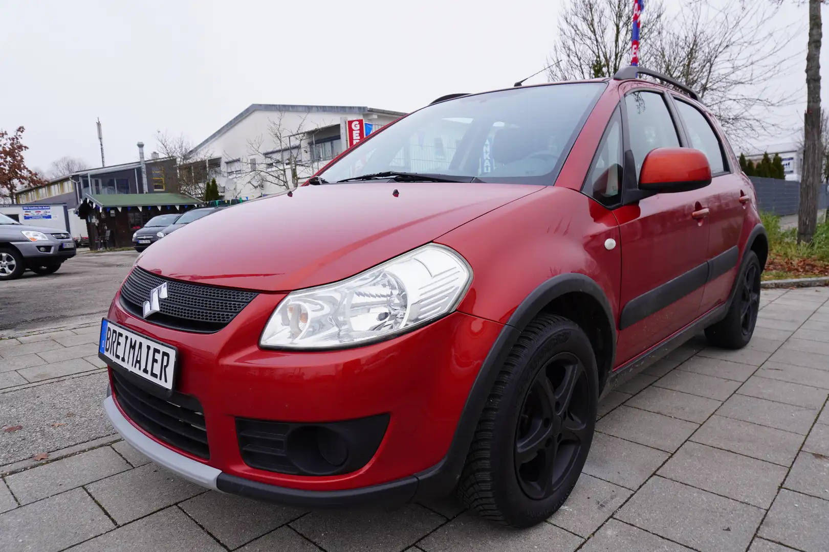 Suzuki SX4 ALLRAD*CLUB*TÜV NEU*4x4*107 PS*KLIMA* Rot - 1