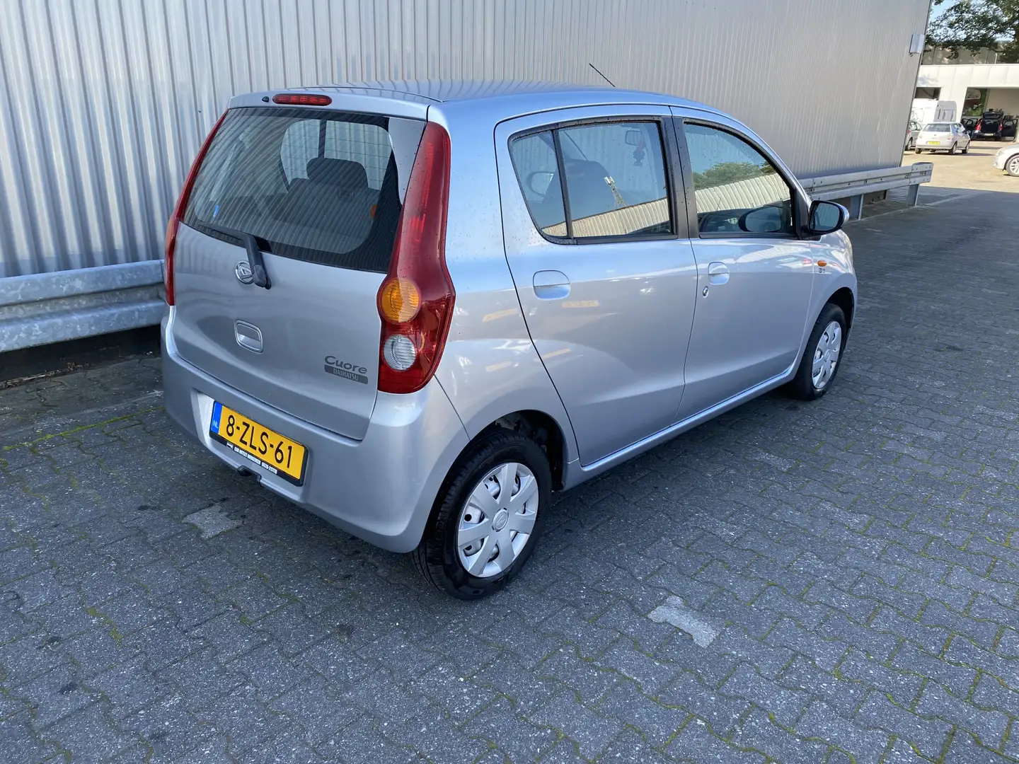 Daihatsu Cuore 1.0 Complete 133Dkm. A/C, AUX, ISO-FIX & z.g.a.n. Grey - 2