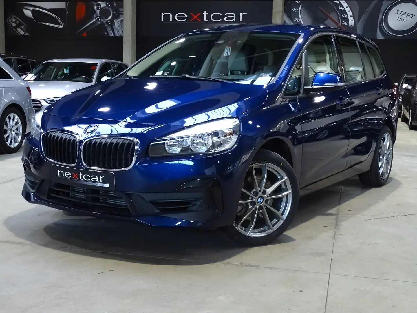 BMW 218 iA Gran Tourer*** CUIR-NAVI-PARKING AV & AR *** Blauw - 1