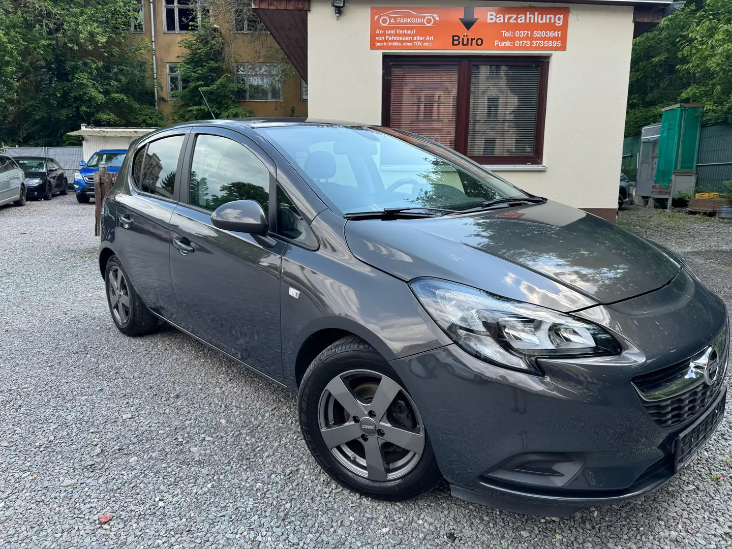 Opel Corsa 1.4 Automatik Edition Grijs - 1