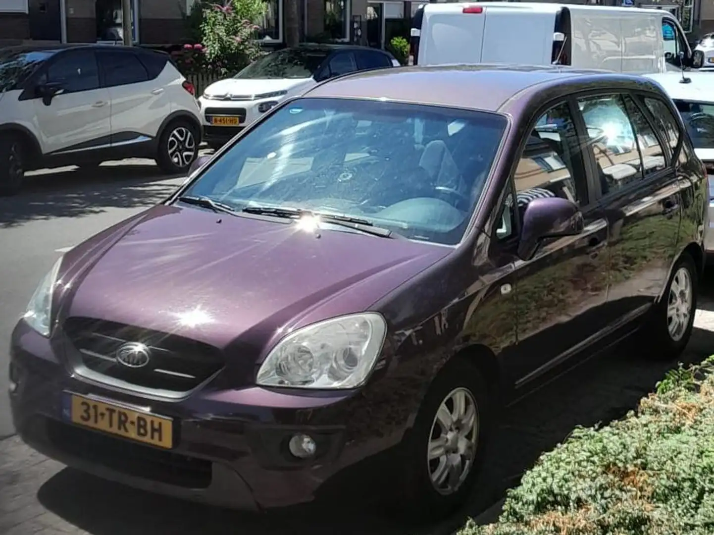 Kia Carens Carens 2.0 CVVT X-tra 7persoons - tweede eigenaar. Violet - 1