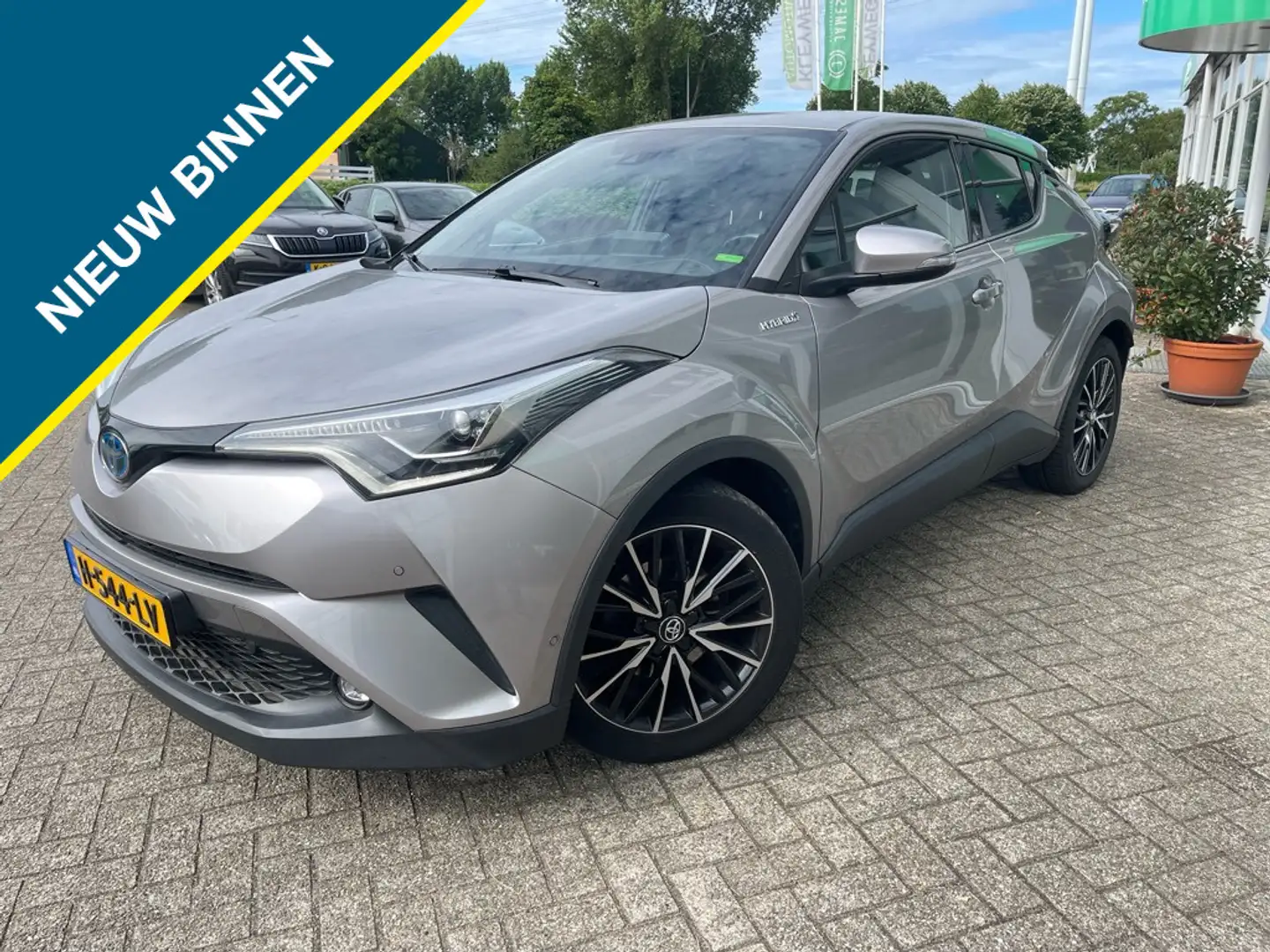 Toyota C-HR 1.8 Hybrid Executive, Nav, Camera, Leder, Stoelver Grijs - 1