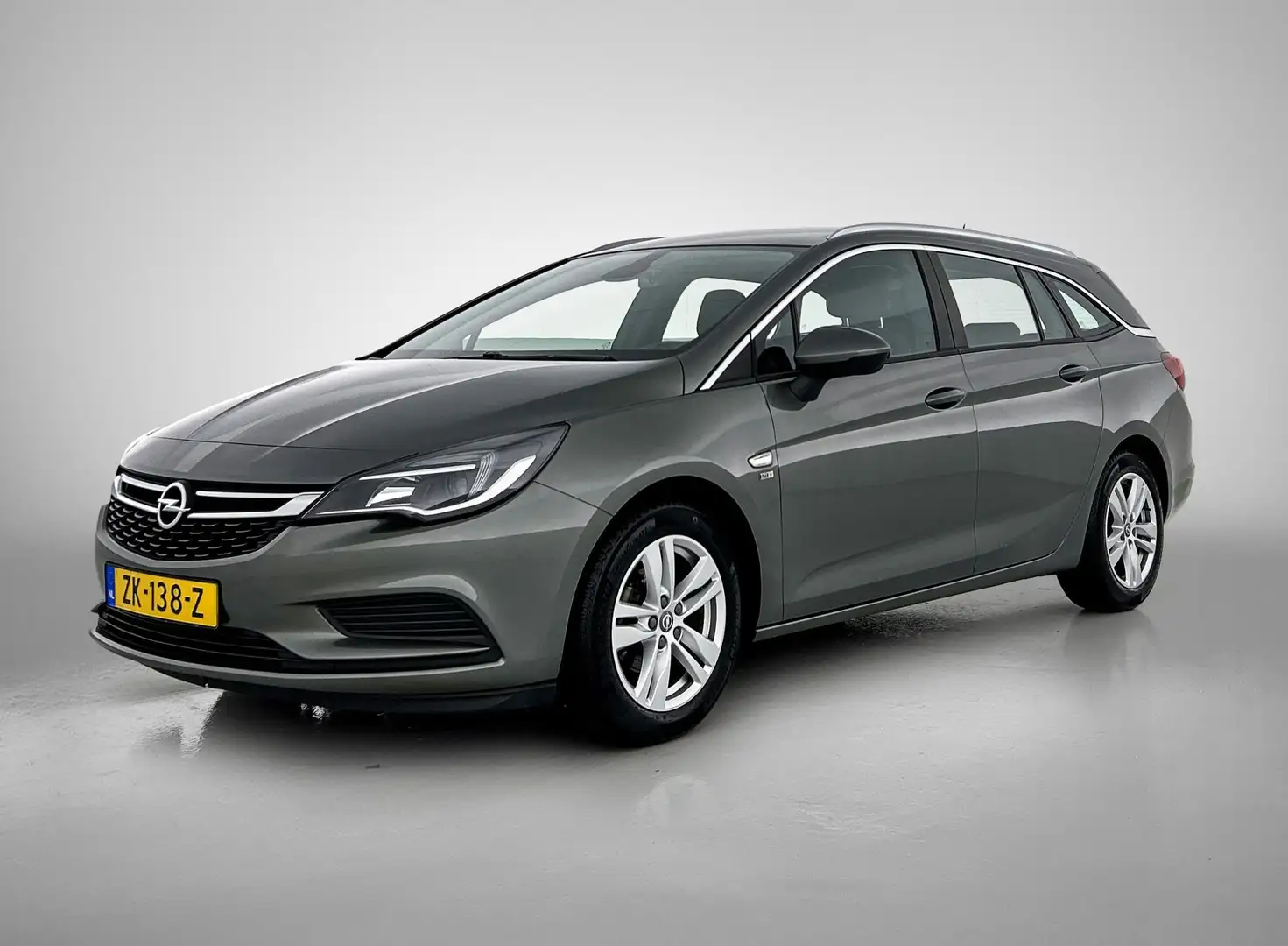 Opel Astra Sports Tourer 1.4 Turbo 120 Jaar Edition (TREKHAAK Grijs - 1