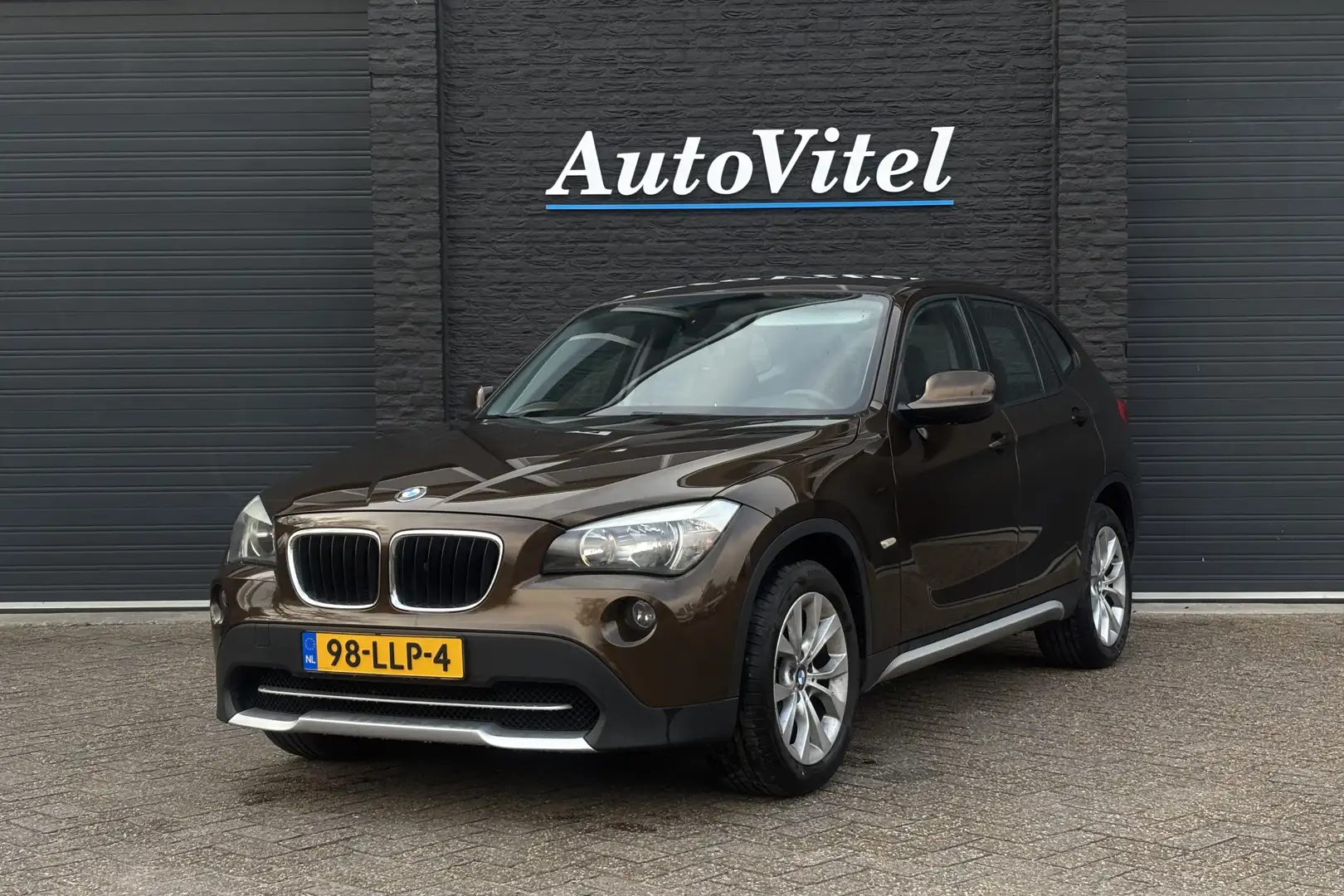 BMW X1 sDrive18i Executive | Trekhaak | Navi | Clima | PD Marrone - 1