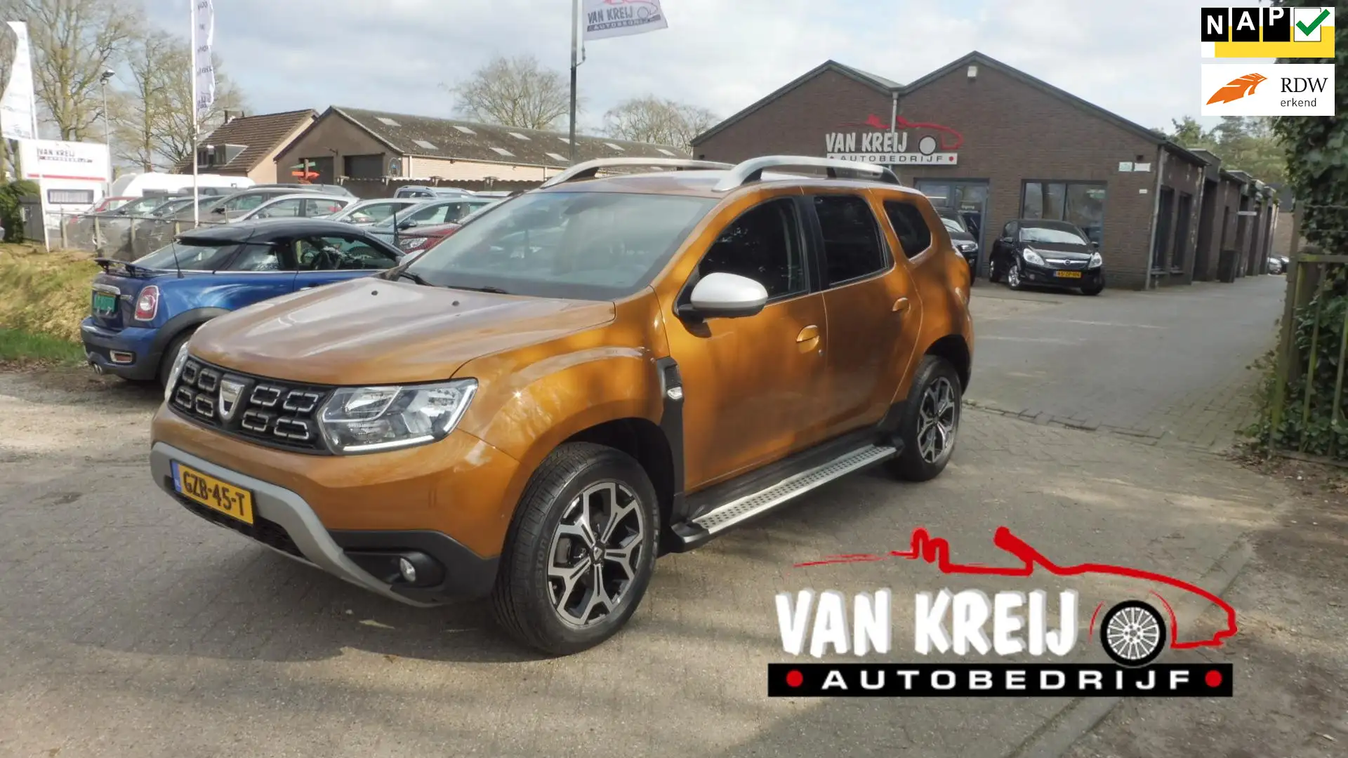 Dacia Duster 1.2 TCe Prestige, Navi, Camera, Leder, Clima Arancione - 1