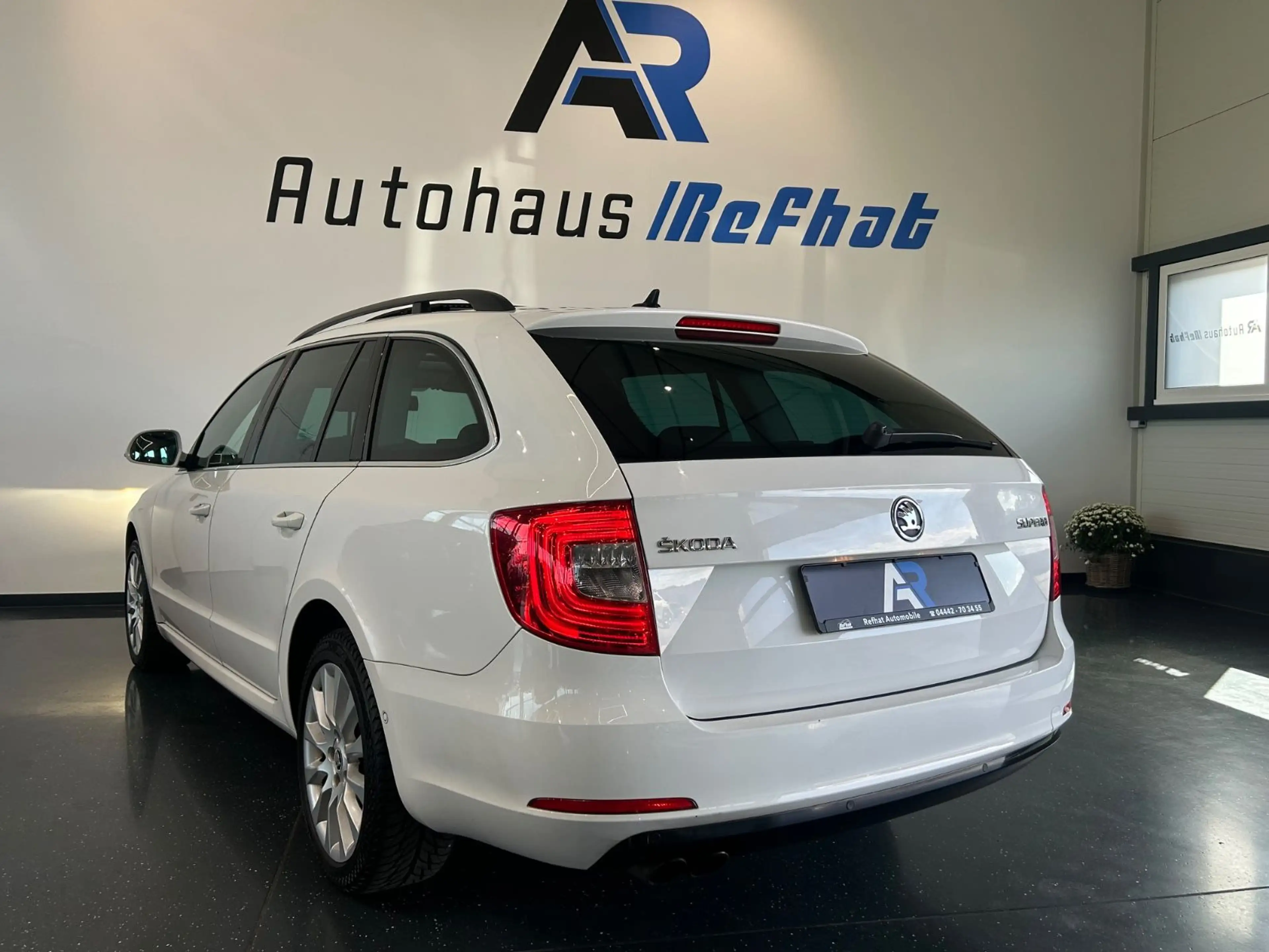 Skoda Superb Combi Exclusive*PDC*PANO*SHZ*MEMORY* — photo 10