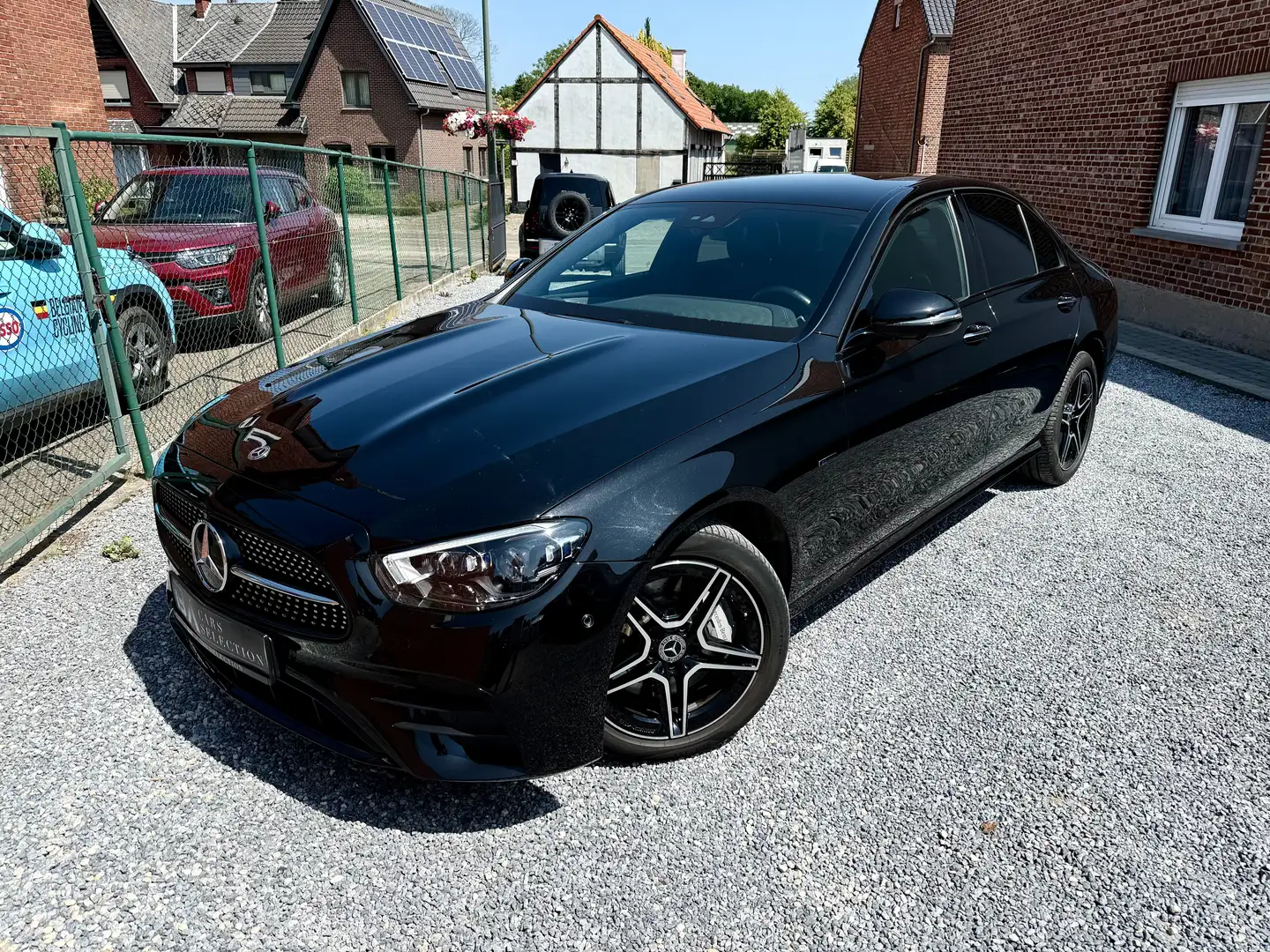 Mercedes-Benz E 300 de PHEV AMG Line | 360 Camera | Led Sfeer | 12m Zwart - 1