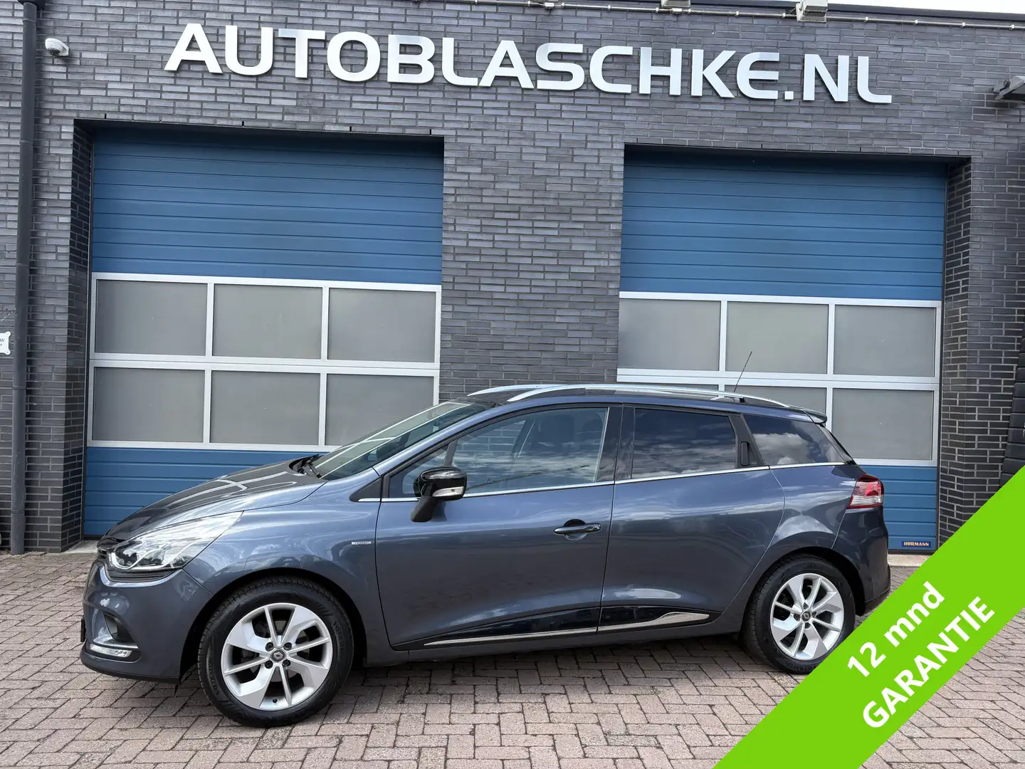 Renault Clio Estate 0.9 TCe Limited, airco/navi/cruise/lmv Gris - 1