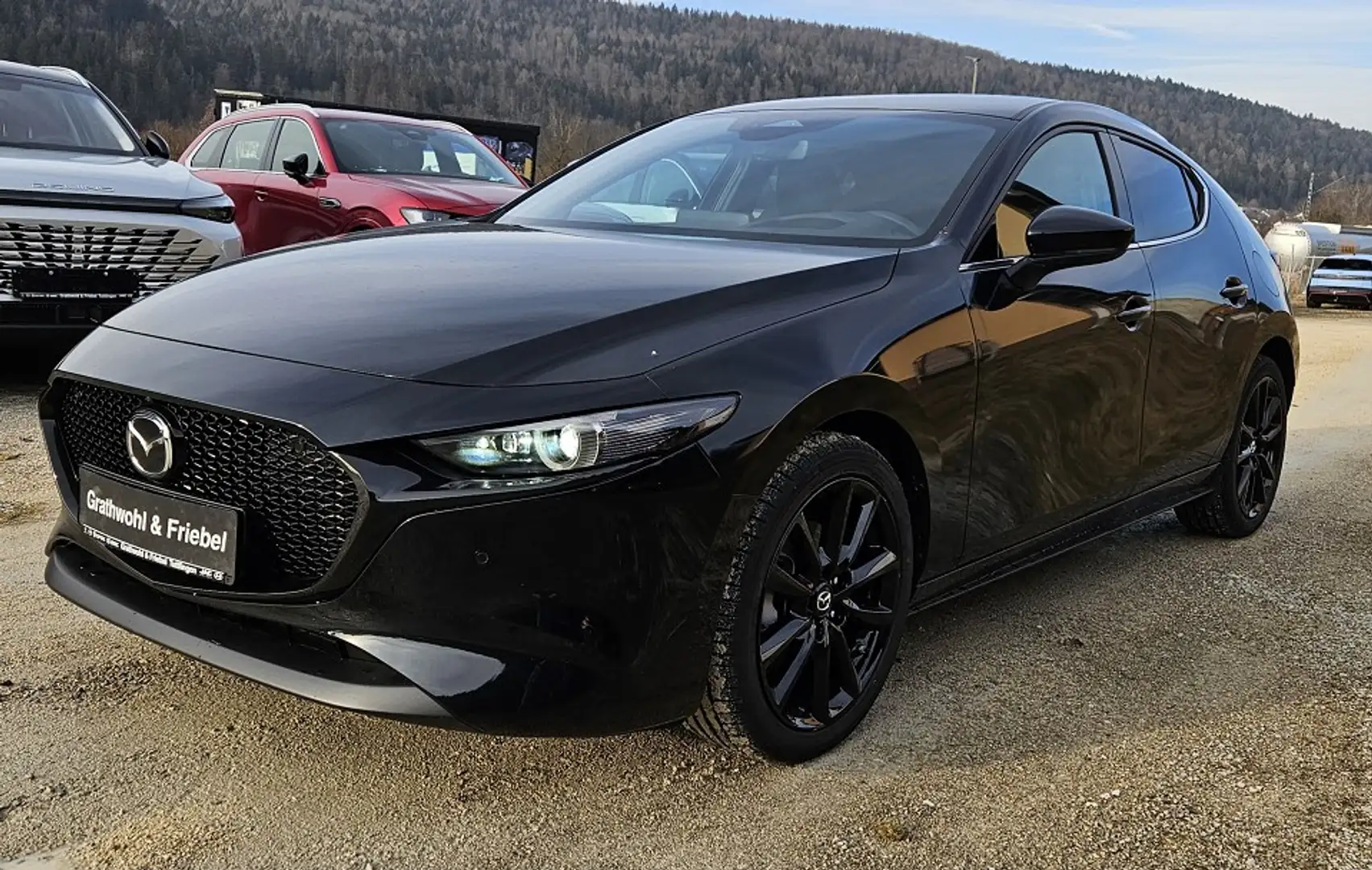 Mazda 3 2.0 e-SKYACTIV X AWD 6AT Exclusive Schwarz - 1