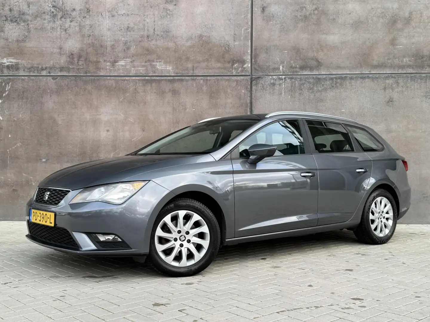 SEAT Leon ST 1.4 TSI Style 1ste Eig! | Navi | Climatecontrol Grijs - 1