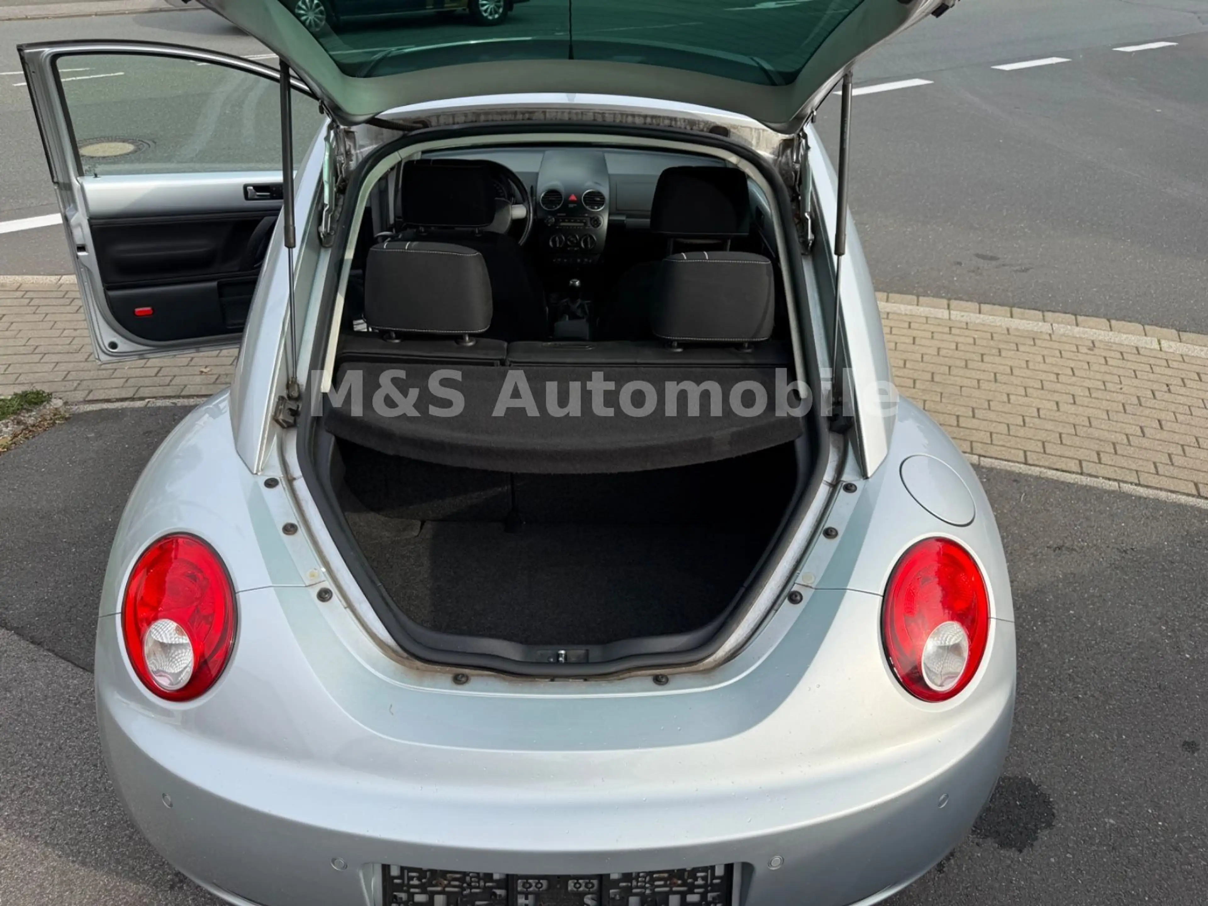 Volkswagen New Beetle 1.9 Klima,SHZ.PDC,Tüv — photo 16