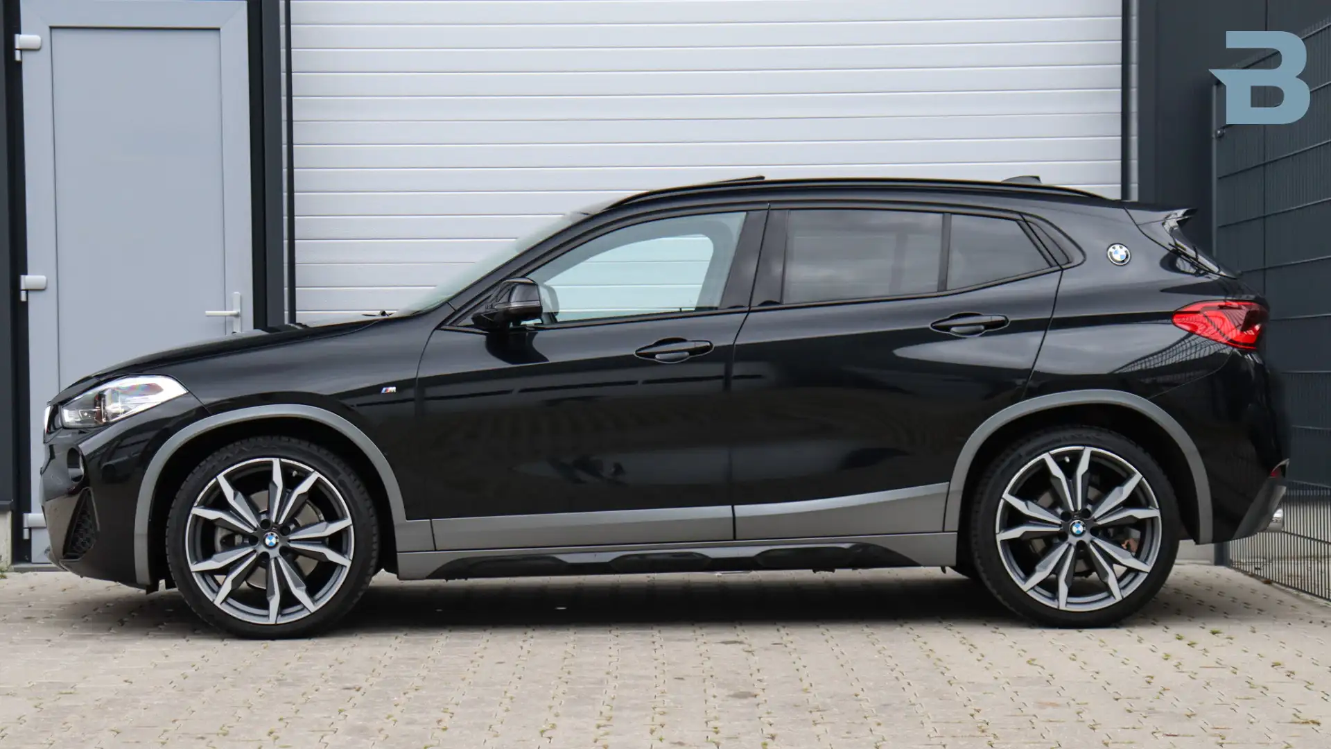 BMW X2 sDrive20i High Executive M-Sport X | Head-up | Pan Zwart - 2