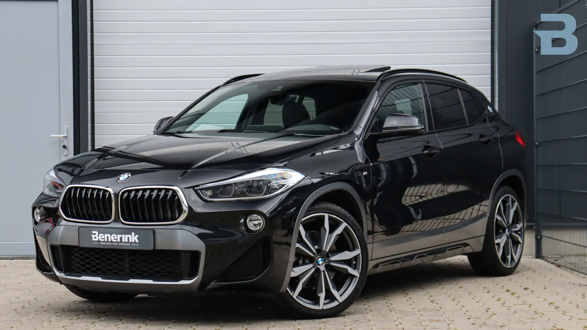 BMW X2 sDrive20i High Executive M-Sport X | Head-up | Pan Zwart - 1