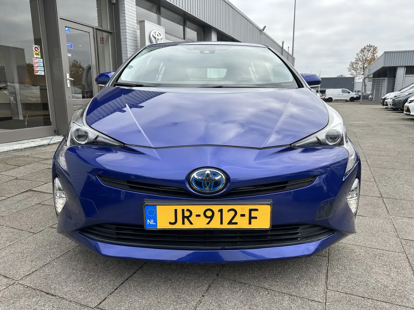 Toyota Prius 1.8 Hybrid Aspiration Automaat | Trekhaak | Cruise Blauw - 2