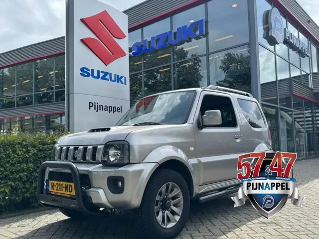 Suzuki Jimny 1.3 Exclusive 4x4 Airco/Leder/Trekhaak/Camera acht