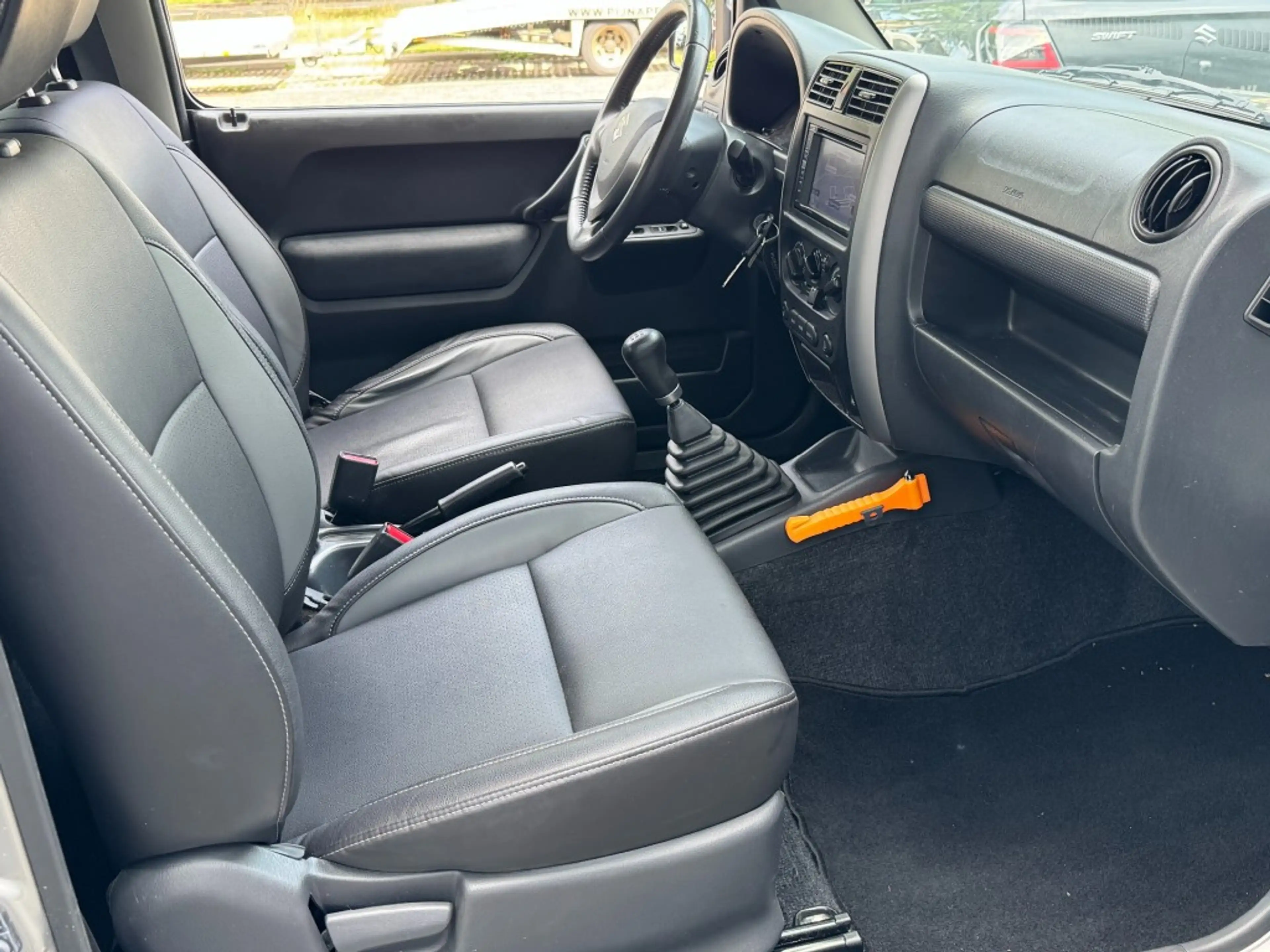 Suzuki Jimny 1.3 Exclusive 4x4 Airco/Leder/Trekhaak/Camera acht — photo 3