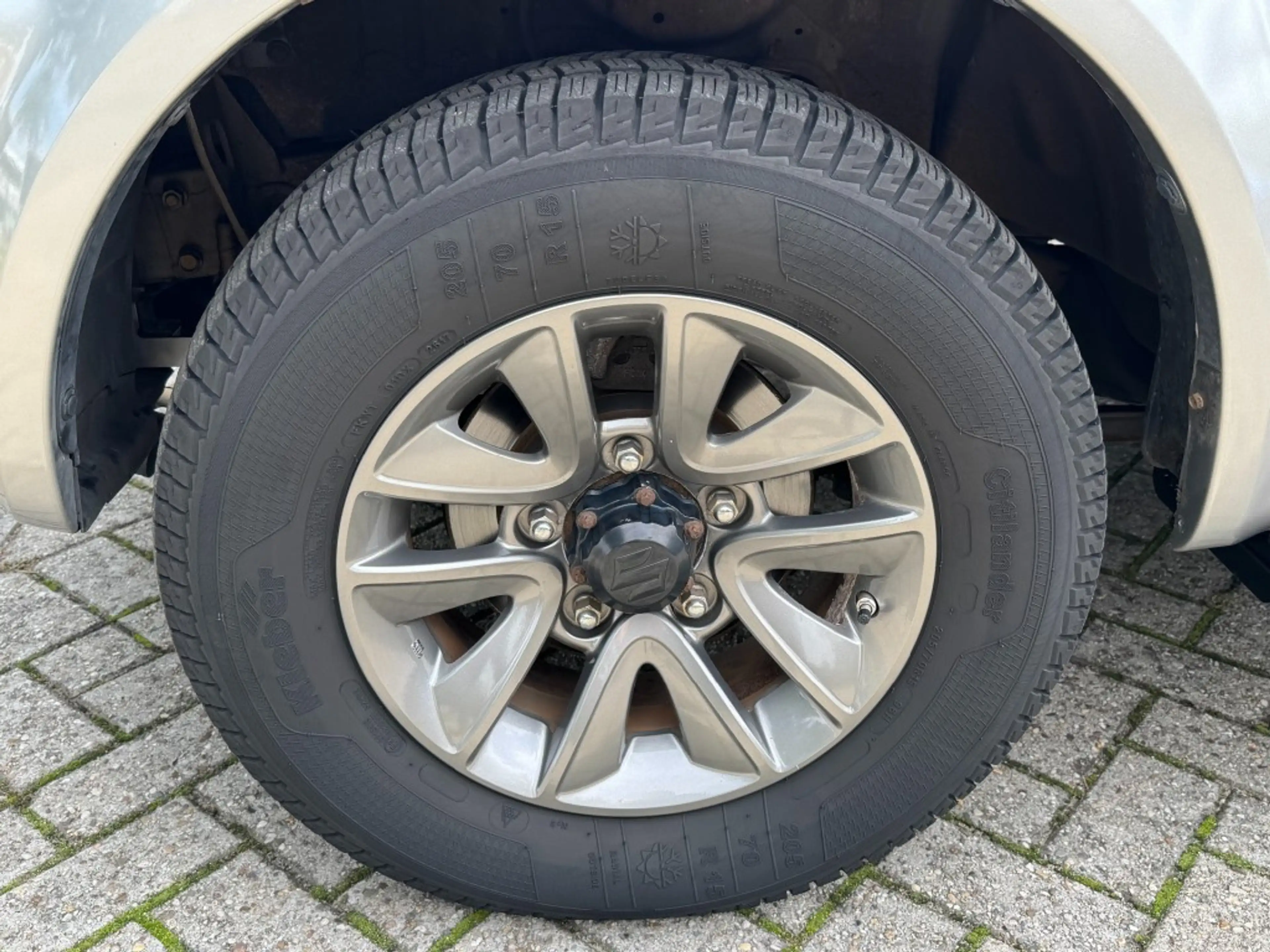 Suzuki Jimny 1.3 Exclusive 4x4 Airco/Leder/Trekhaak/Camera acht — photo 18