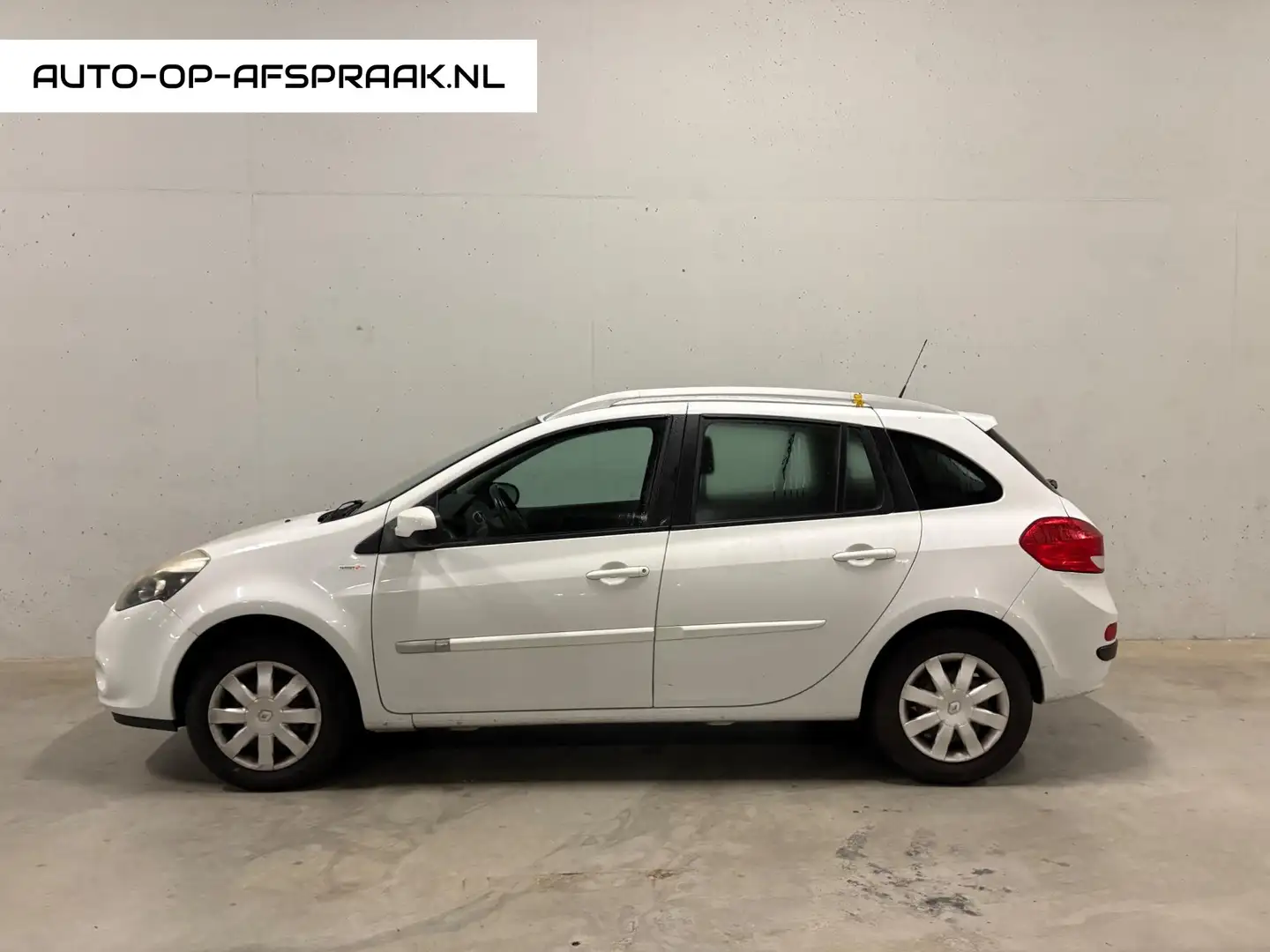 Renault Clio Estate 1.2 TOMTOM Editie Navi Airco Cruise Control Weiß - 1