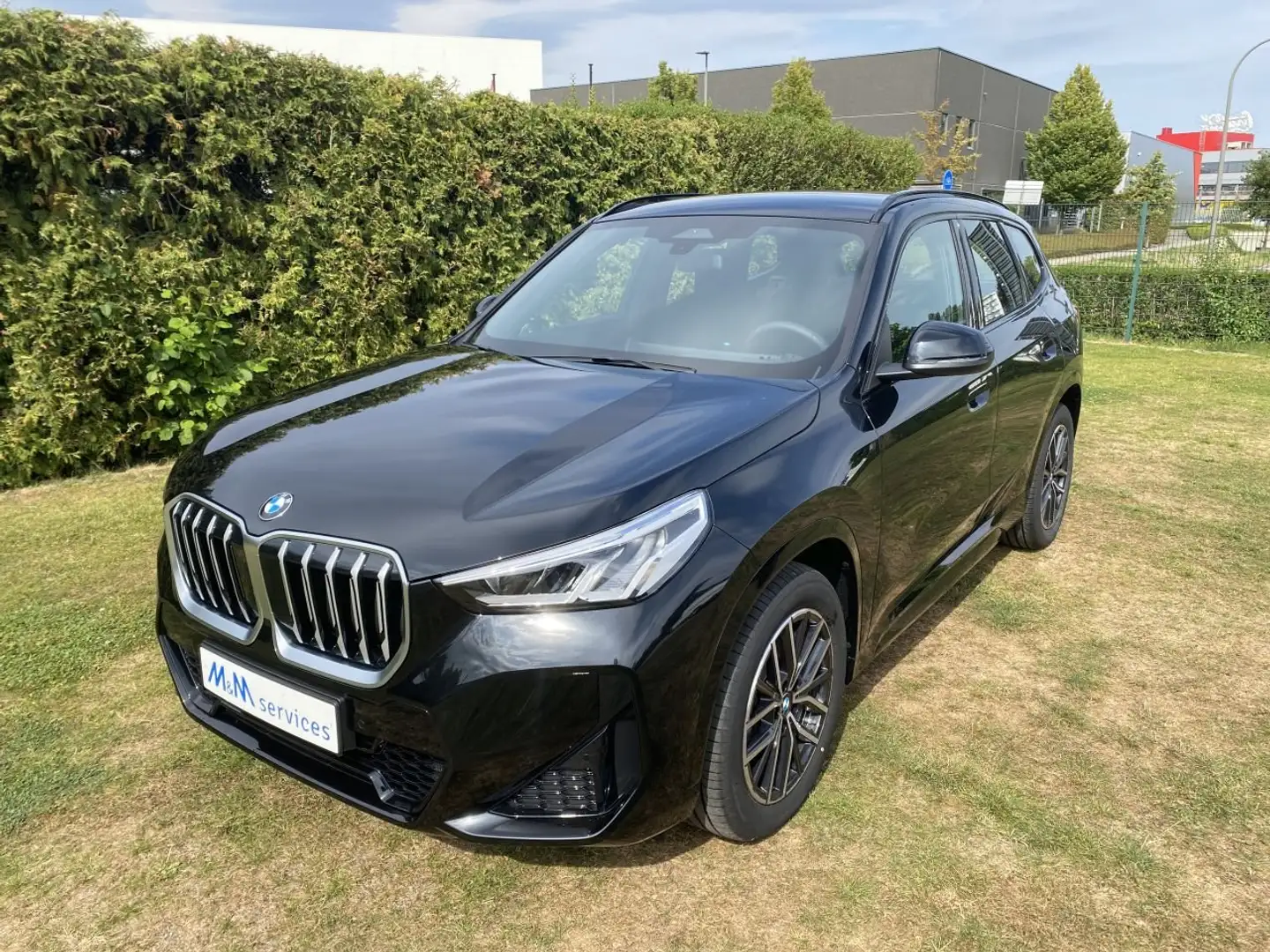 BMW X1 X1 sDrive18i Aut. M Sportpack Zwart - 1