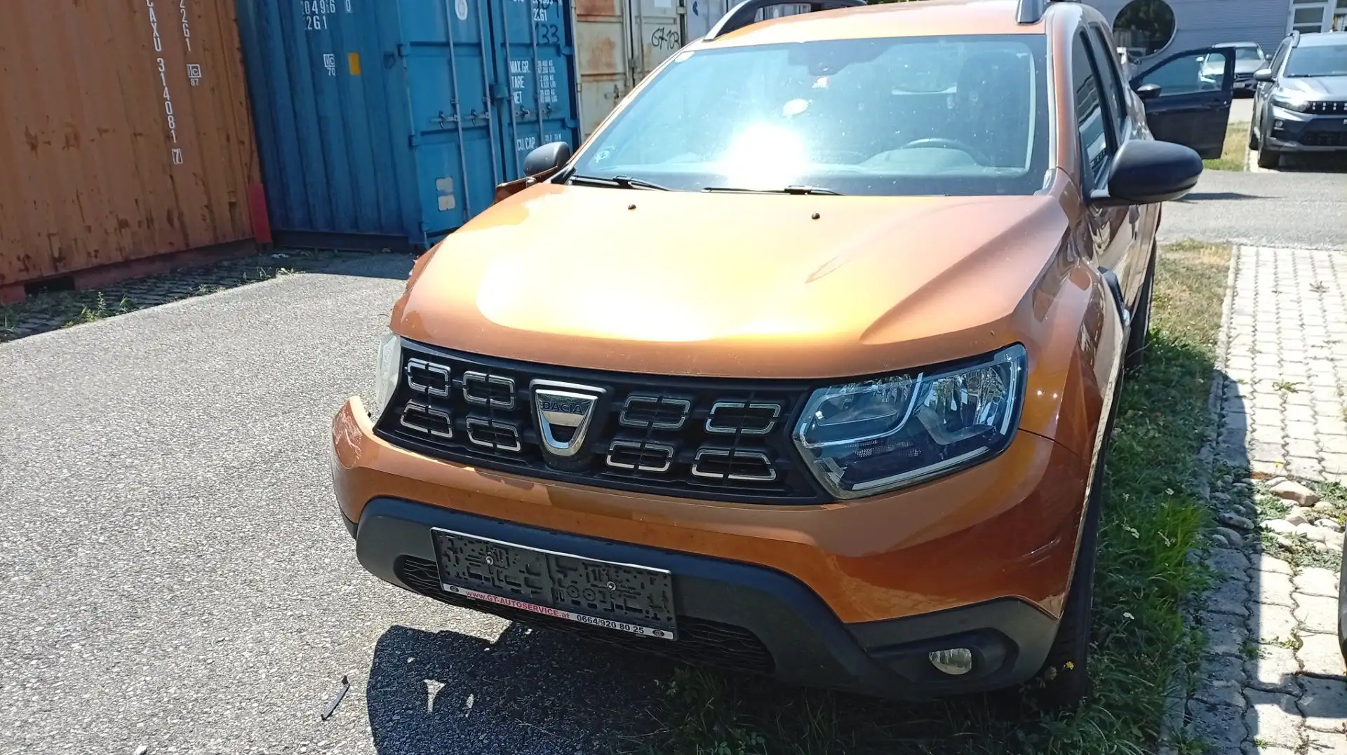 Dacia Duster II 1.6 SCe 115 Comfort 2WD Orange - 1