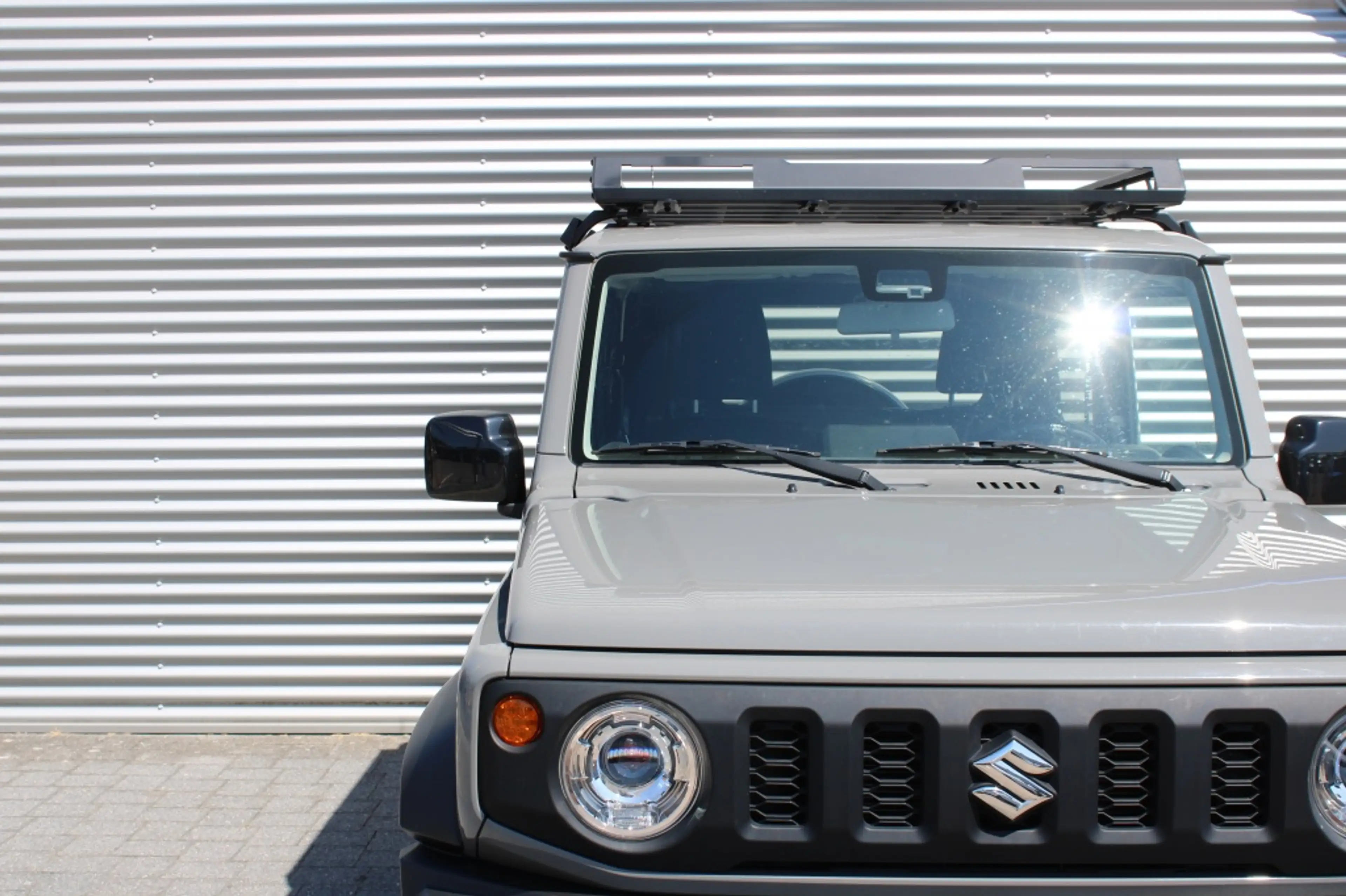 Suzuki Jimny 1.5 Stijl | 4x4 | AllGrip | 4 Persoons | Roofrack — photo 9