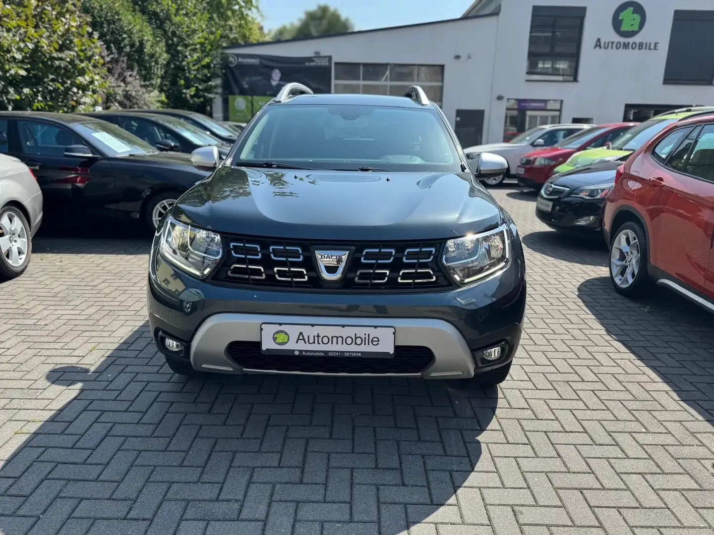 Dacia Duster II Prestige*NAVI*PDC*KAM*SHZ*TEMPO*DAB Grau - 2