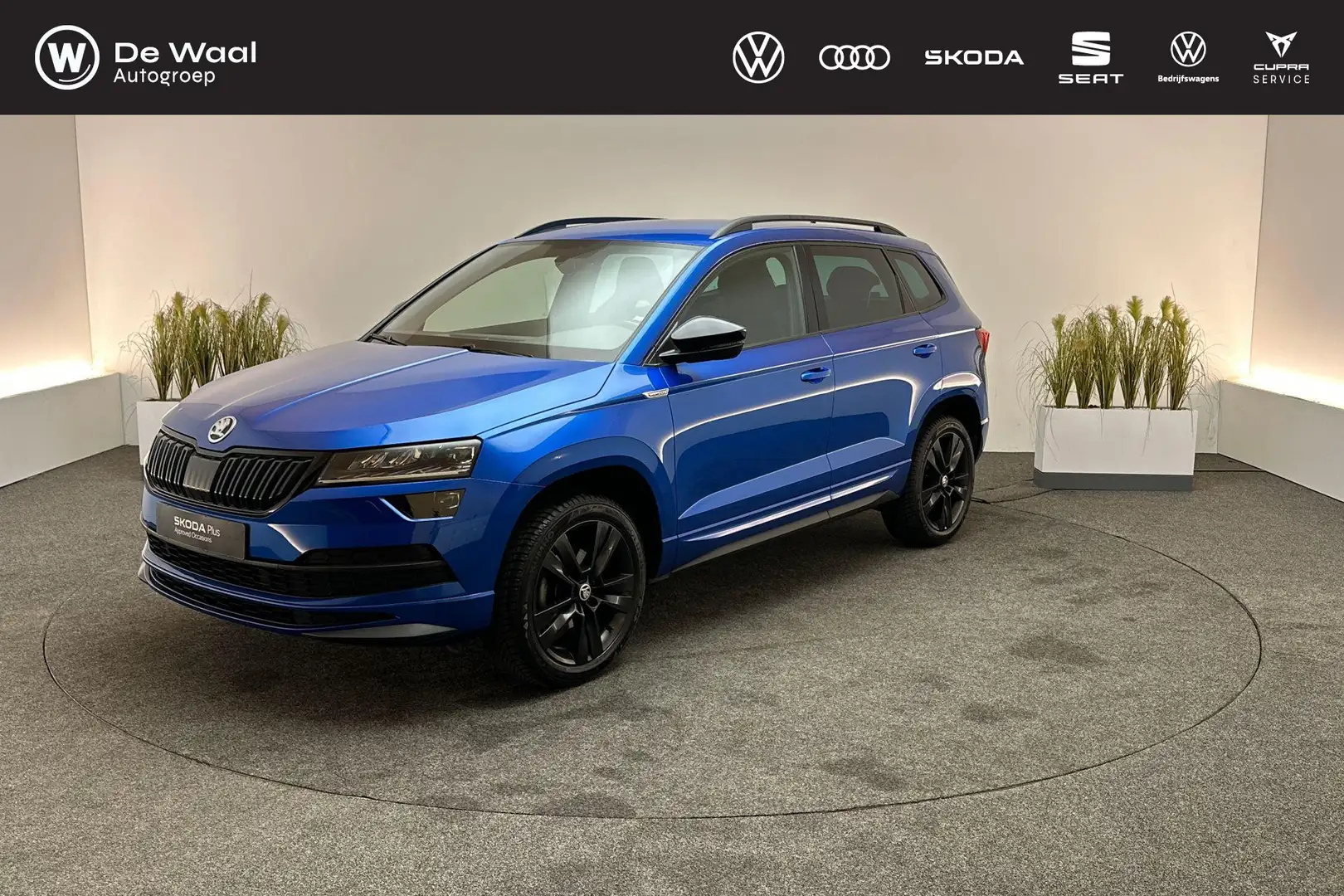 Skoda Karoq 1.5 TSI 150pk DSG ACT Sportline Business | Stoelve Blau - 1