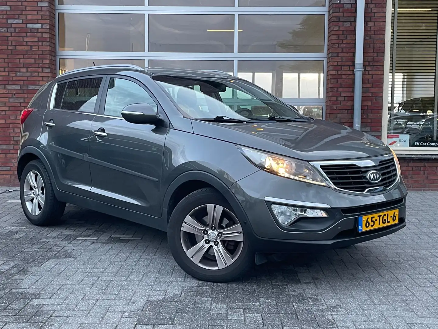 Kia Sportage 1.6 GDI X-ecutive Plus Pack | Exportprijs | Airco Grau - 2