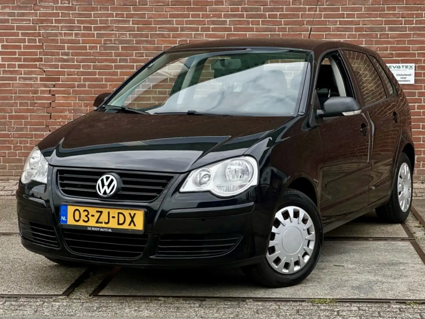 Volkswagen Polo 1.2-12V Comfortline Negro - 1