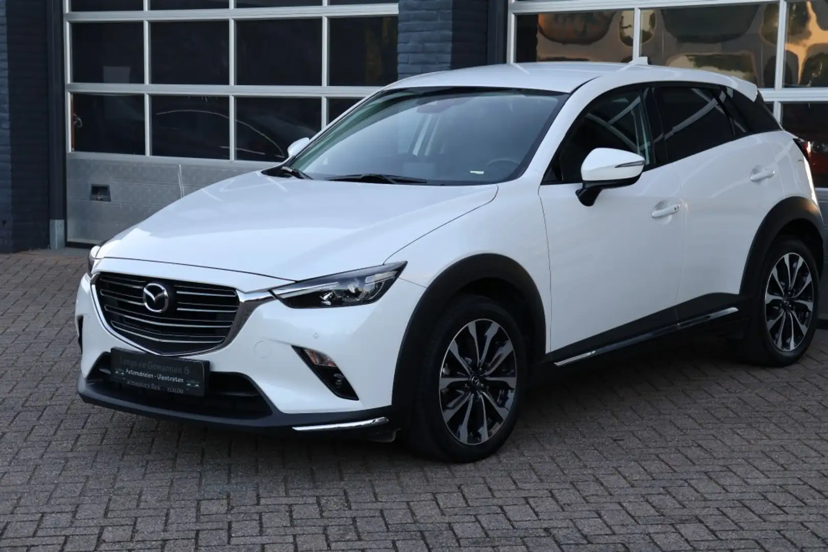 Mazda CX-3 2.0 SkyActiv-G120 GT-M automaat, navigatie, camera Weiß - 1