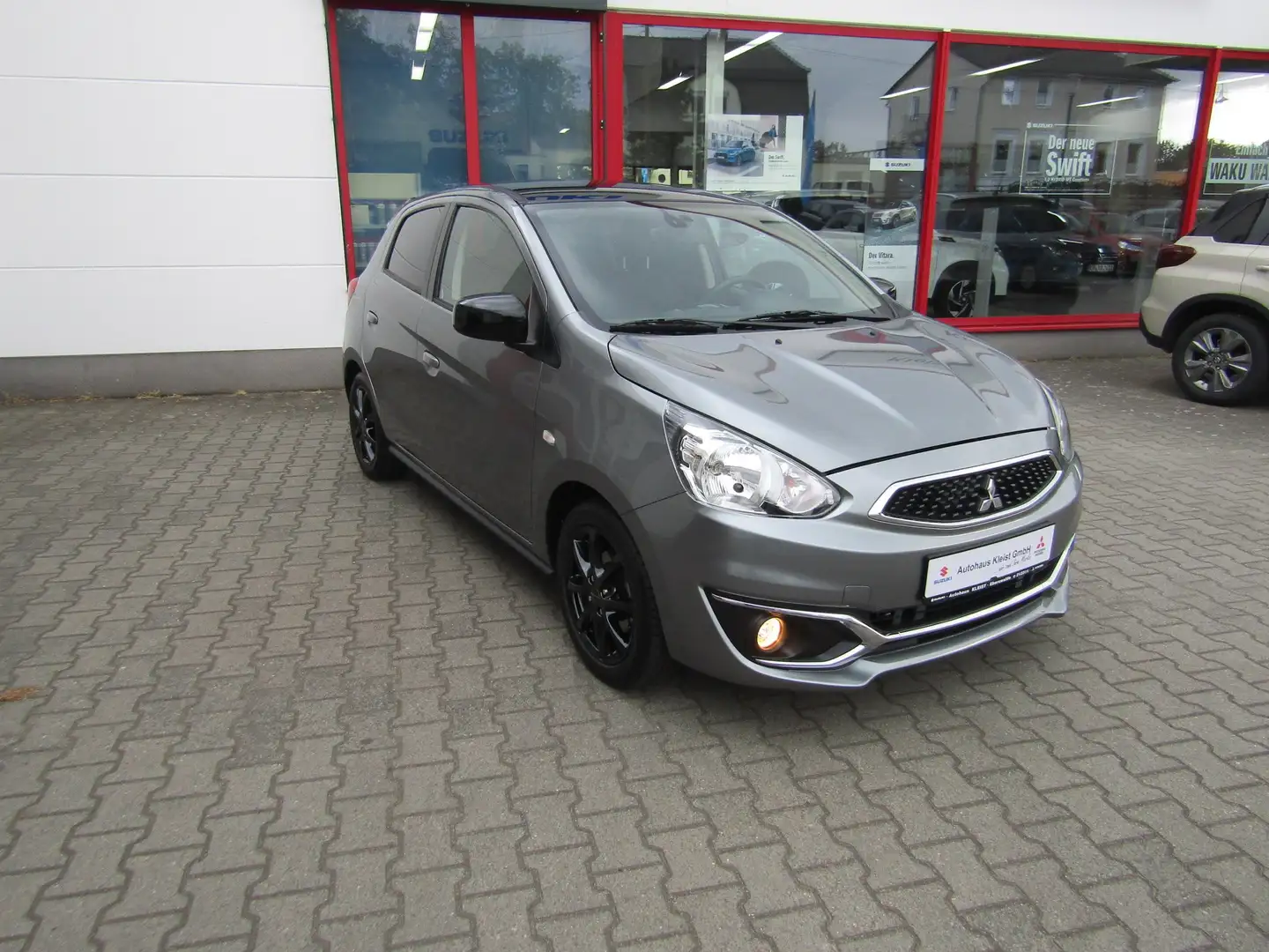Mitsubishi Space Star 1.2CVT DE+ Navi Sitzheizung Klima Winterräder Grau - 1