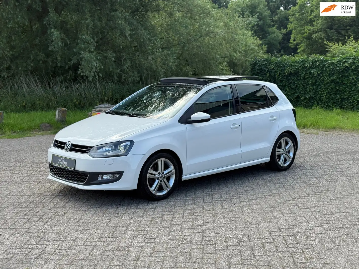 Volkswagen Polo 1.2 TSI Highline PANO I 105PK I 6BAK I PDC I CLIMA Weiß - 1