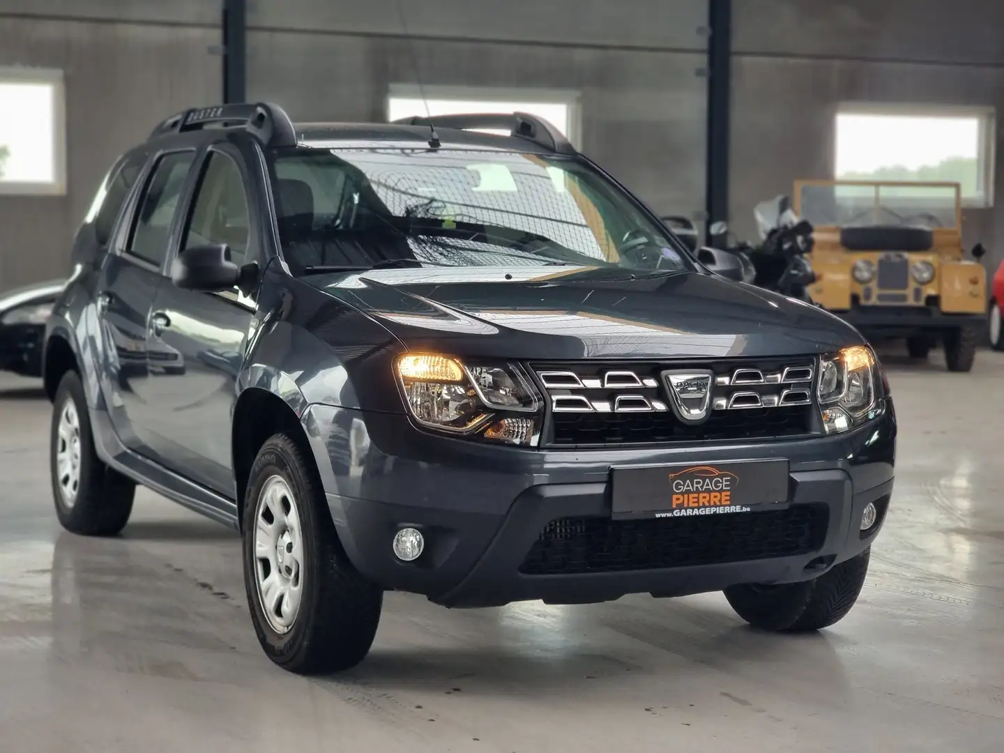 Dacia Duster 1.2 TCe 4x2 Prestige ** WWW.GARAGEPIERRE.BE Gris - 1