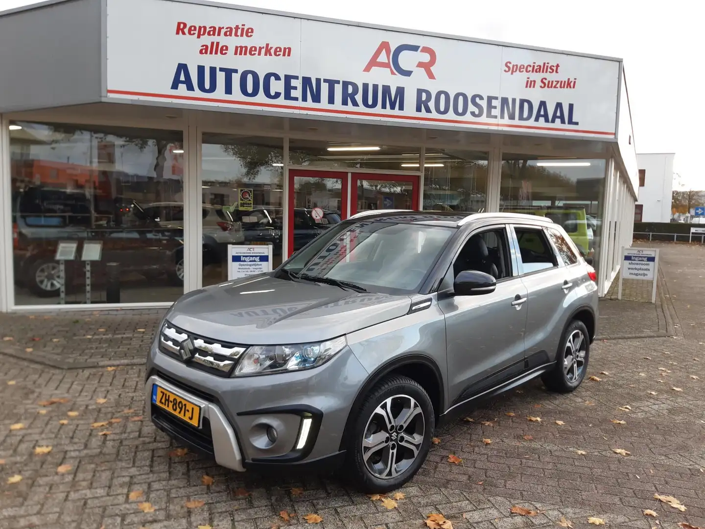 Suzuki Vitara 1.6 High Executive, luxe uitvoering met trekhaak l Gris - 1