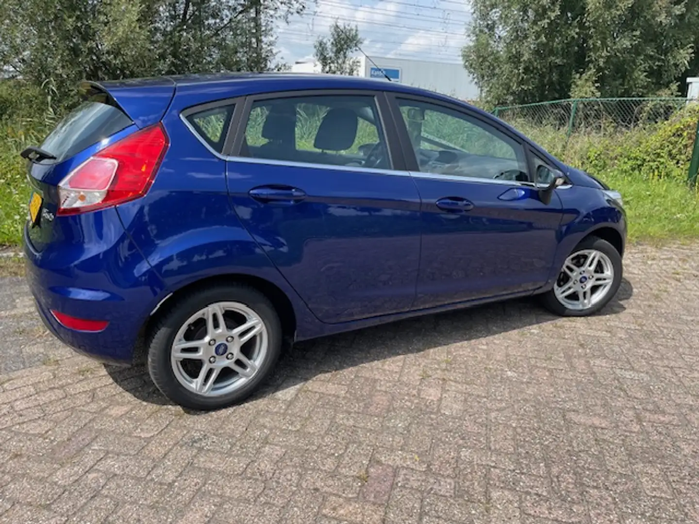 Ford Fiesta 1.0 EcoBoost 100PK 5D S/S Titanium Blauw - 1