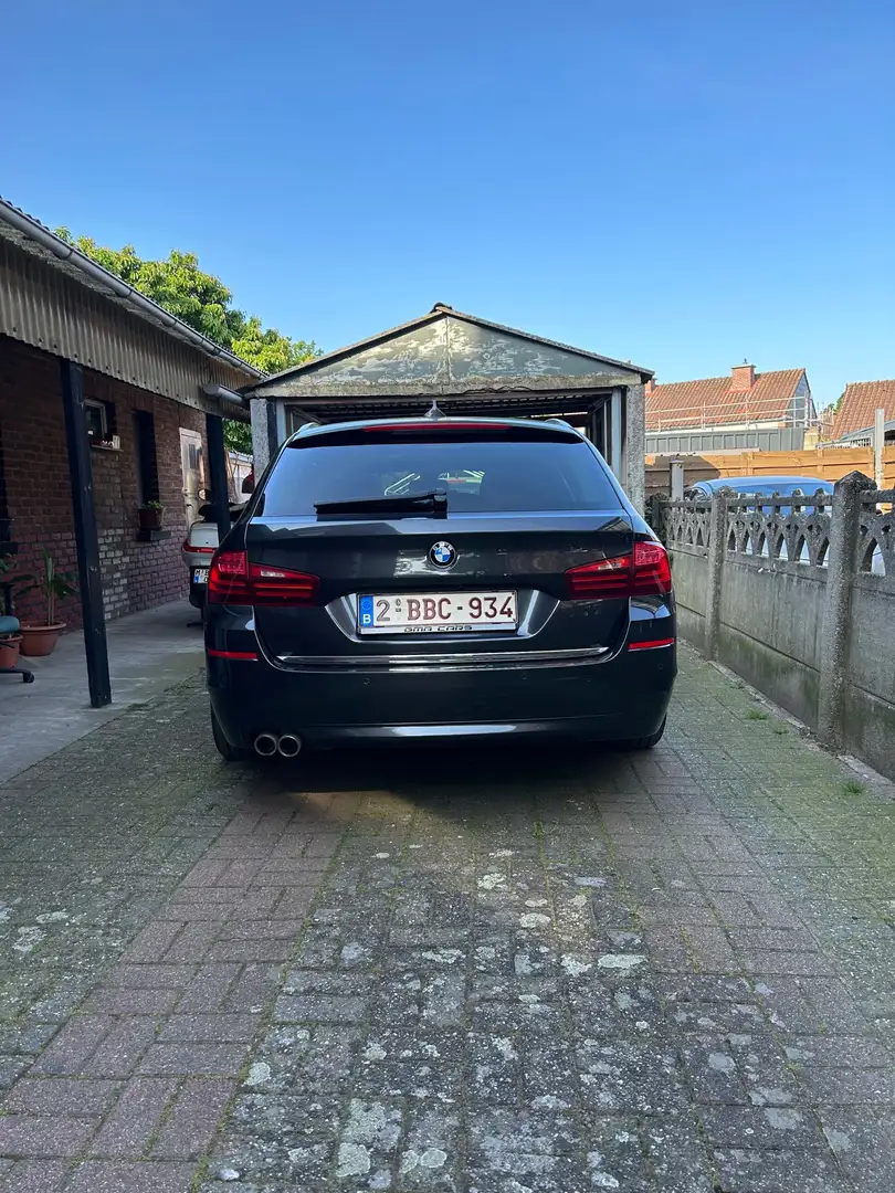 BMW 520 520d Touring Aut. Luxury Line Zwart - 2