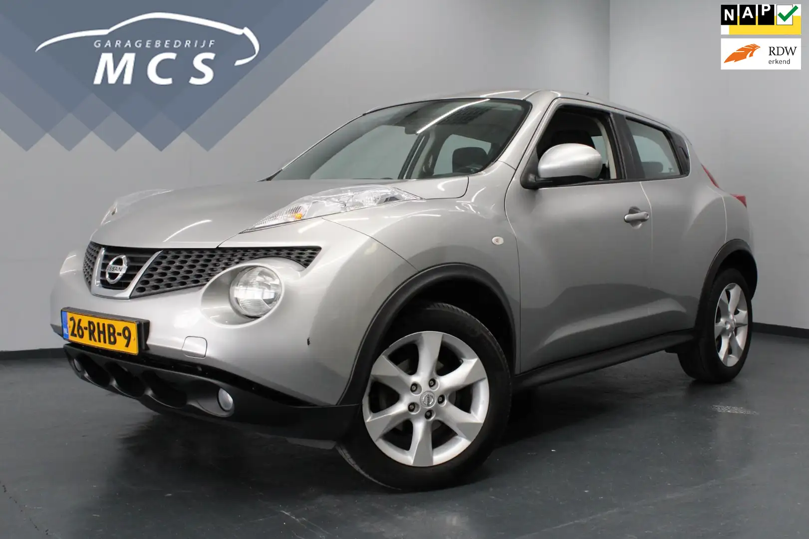 Nissan Juke 1.6 Acenta Eco / Airco / Elektr ramen Grijs - 1