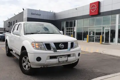 White 2010 Nissan Frontier Pickup Truck Four-Wheel Drive 5-Speed Automatic