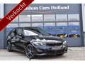 BMW 330 3-serie Touring 330e xDrive M-Sport 292 Pk Pano He Zwart - thumbnail 1