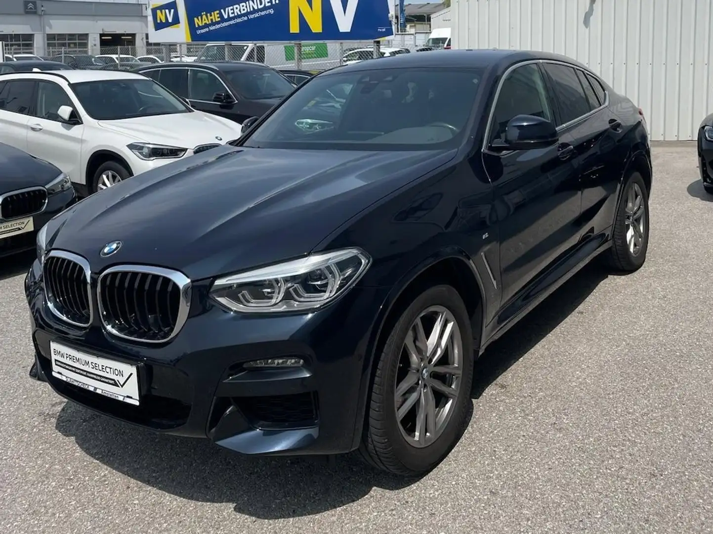 BMW X4 xDrive 20 d Hybr. M Sport*Garantie*AHV*Kamera*Navi Schwarz - 1