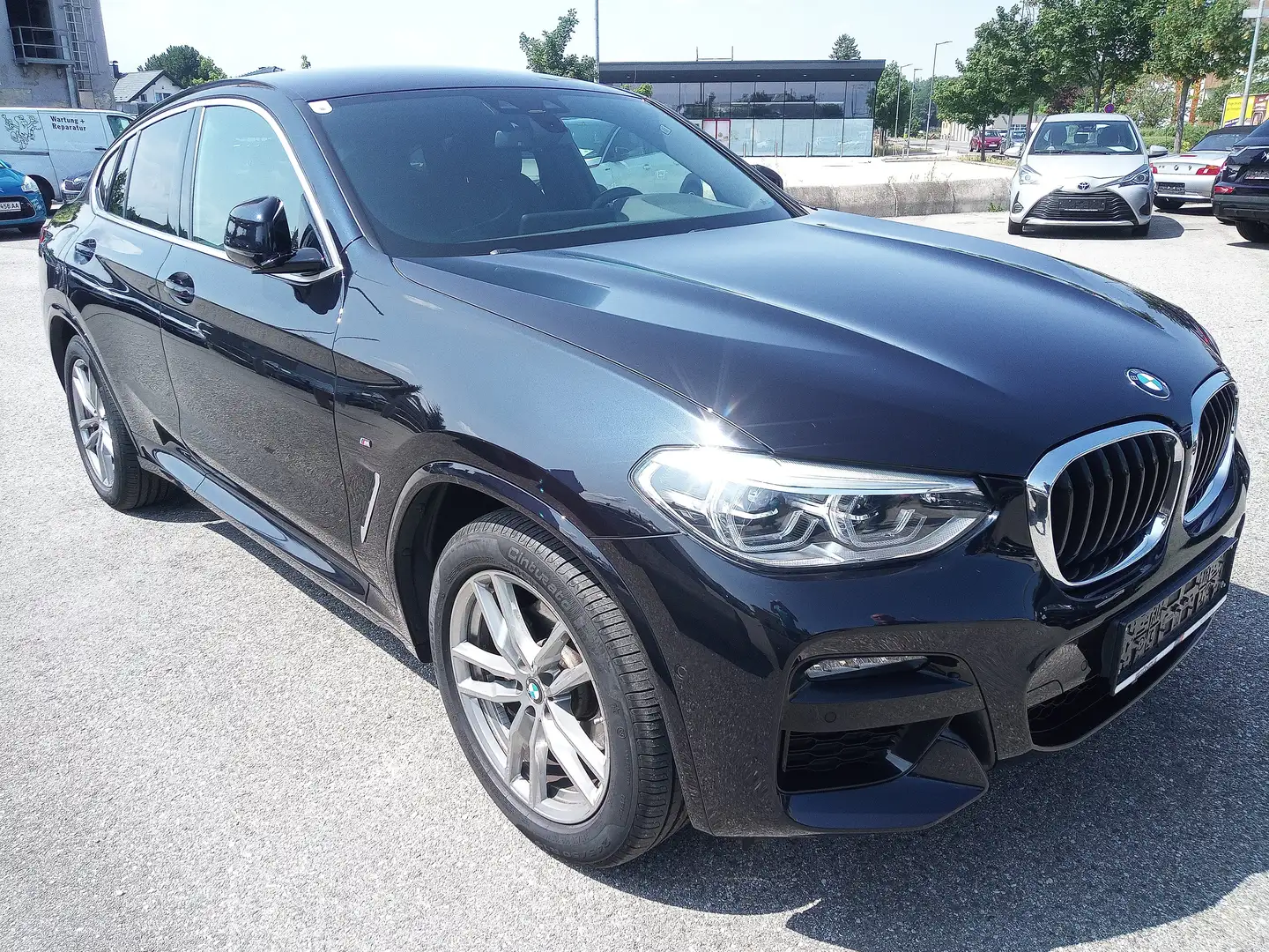 BMW X4 xDrive 20 d Hybr. M Sport*Garantie*AHV*Kamera*Navi Schwarz - 1