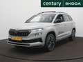 Skoda Karoq 1.5 TSI ACT Sportline Business Automaat - Trekhaak Gris - thumbnail 1