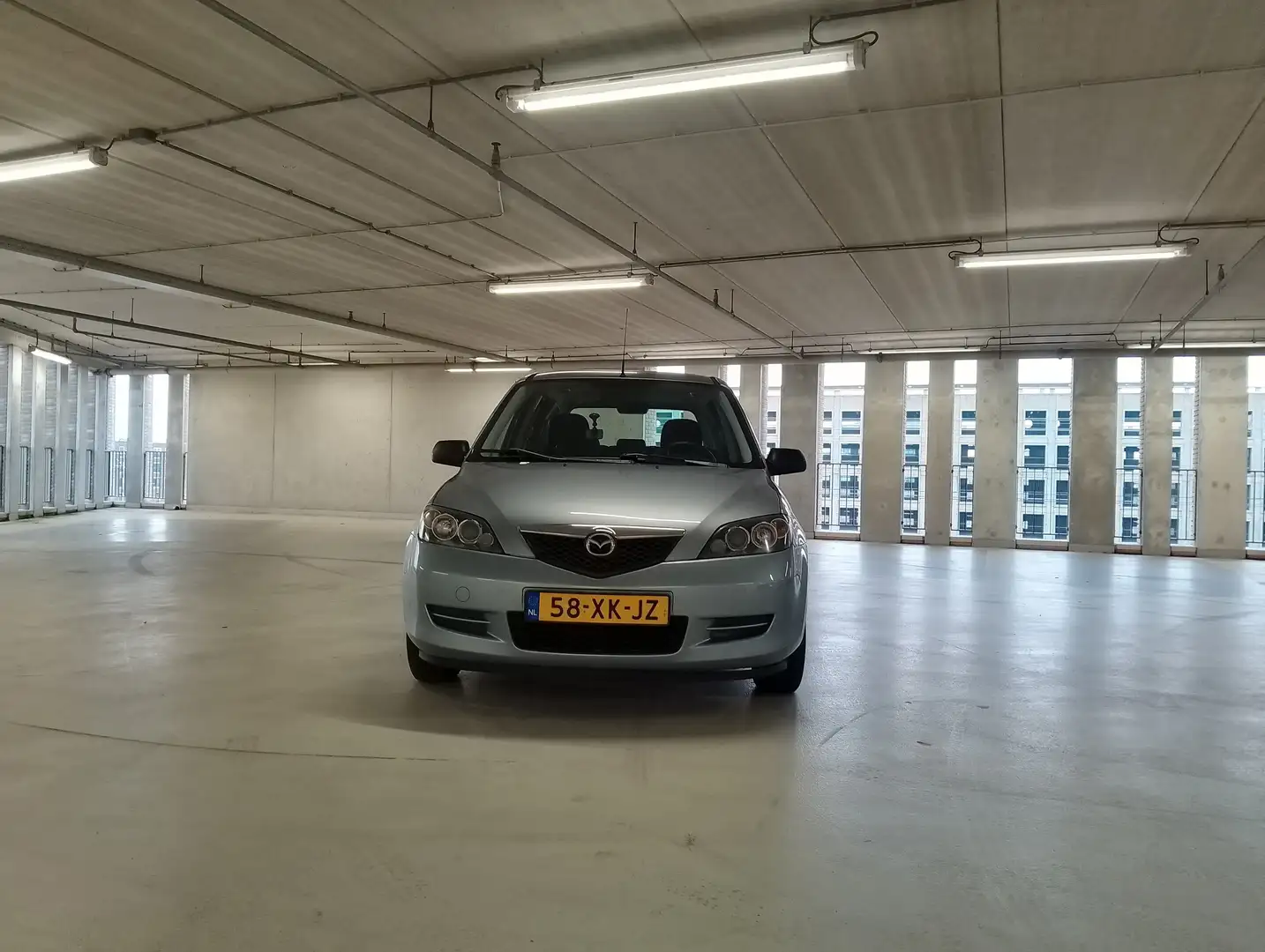 Mazda 2 1.4 Exclusive keurig onderhouden, 5-deurs, airco Azul - 1