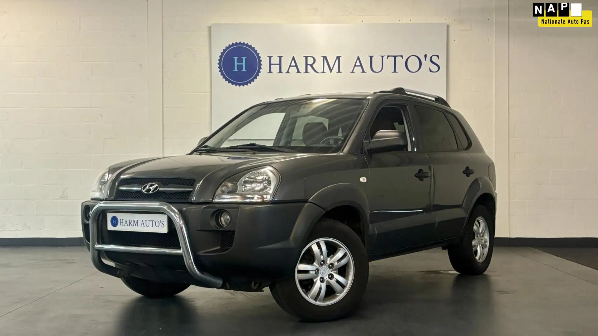 Hyundai TUCSON 2.0i Dynamic 140pk Airco / Cruise / Bullbar / Trek Grijs - 1