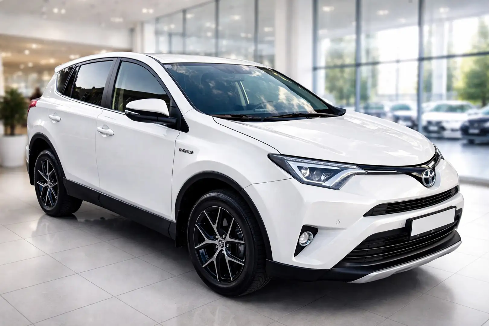 Toyota RAV 4 RAV4 2,5 Hybrid Active 2WD Aut. Weiß - 1