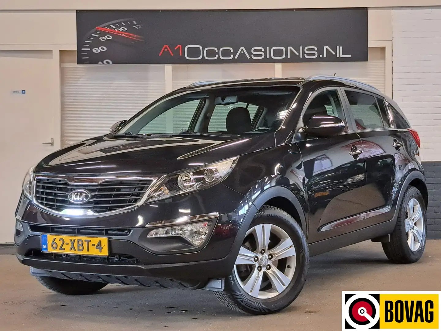 Kia Sportage 2.0 Plus Pack + NAVI Zwart - 1