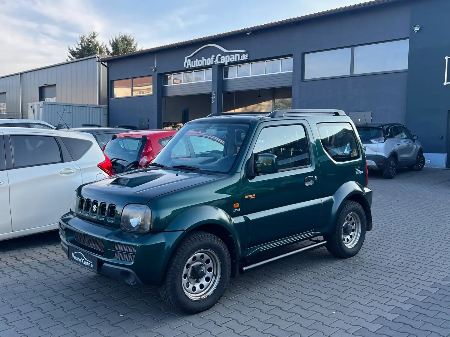 Suzuki Jimny Jimny Ranger/2.Ha/AHK/TÜV 04.27/4x4/ZV/ Grün - 1