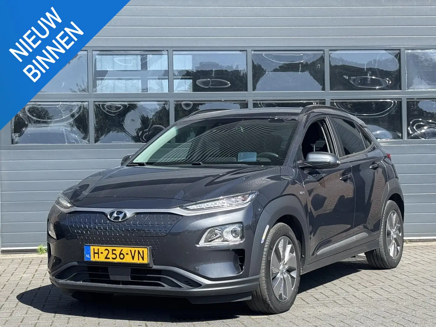 Hyundai KONA EV FASHION 64 KWH I 3 FASE LADEN I APPLE CARPLAY I Grijs - 1