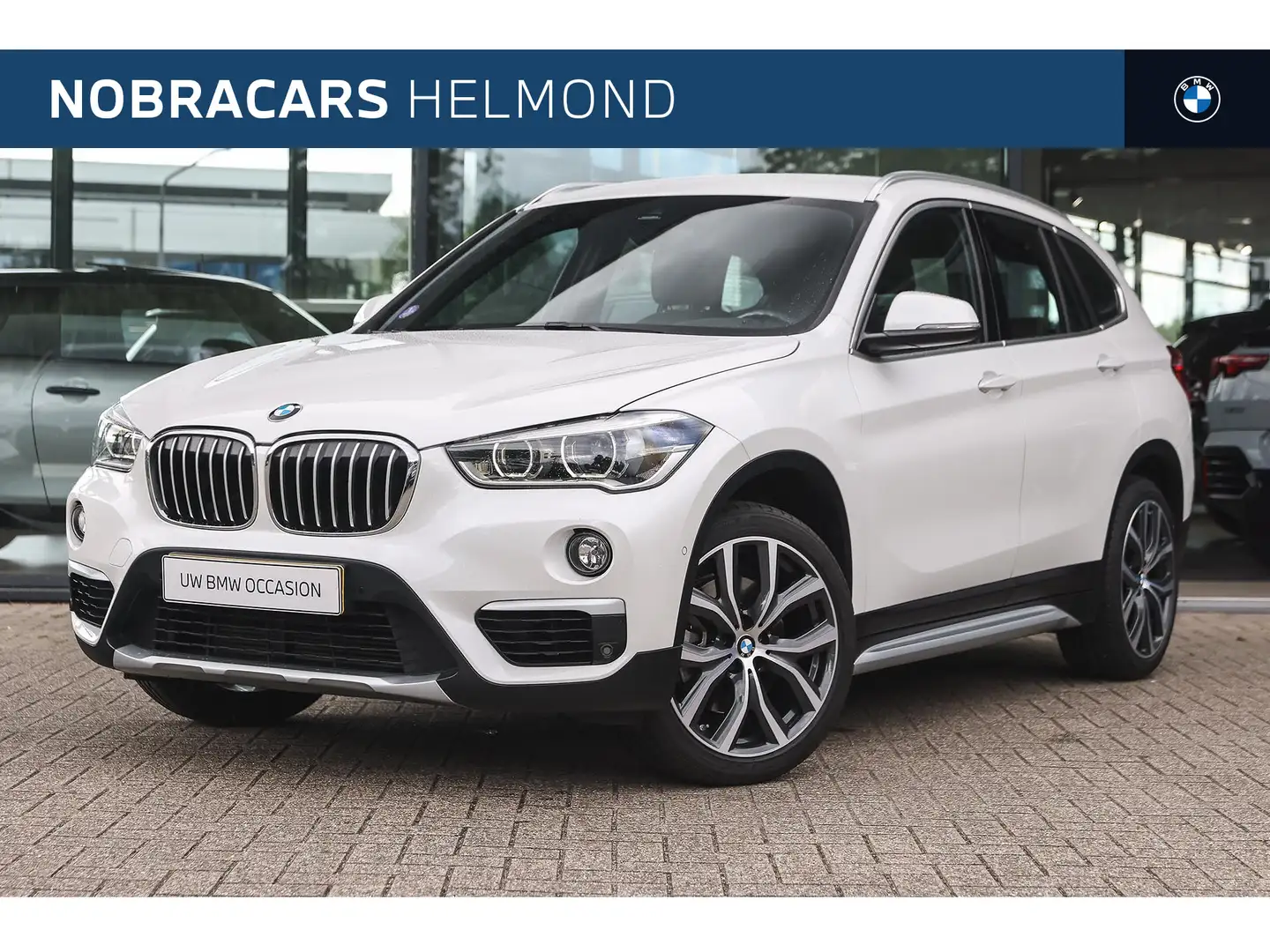 BMW X1 xDrive20i High Executive xLine Automaat / Sportsto Wit - 1