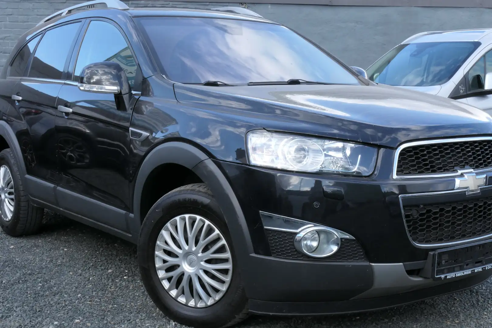 Chevrolet Captiva 2.2 4WD 7-Sitzer*AHK*Navi*Sitzheizung Černá - 2